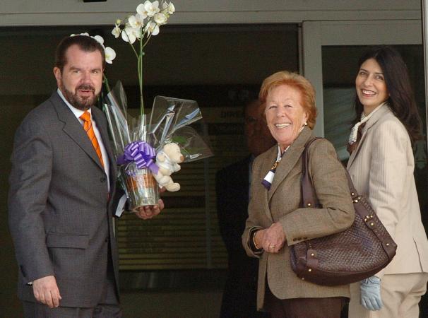 Jesus Ortiz, padre de Doña Letizia, acompañado de su mujer, Ana Togores, y de su madre, la periodista asturiana Menchu del Valle, llegan a la clinica Ruber Internacional, poco despues de los Reyes de España, para visitar a la Infanta Leonor.
